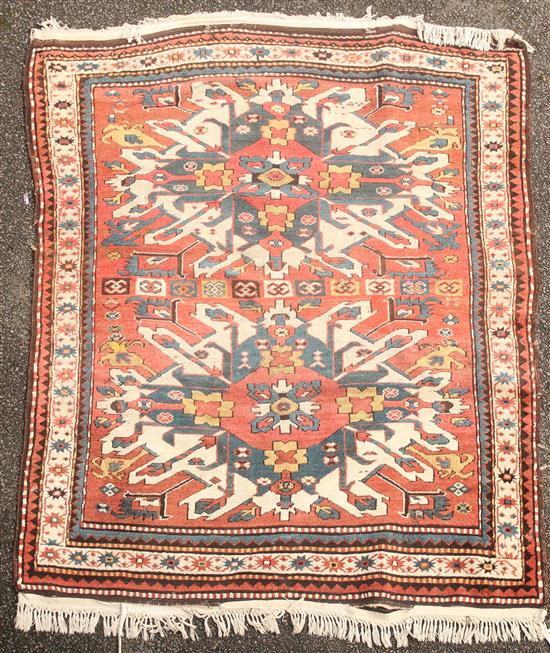 A Kazak rug, 6ft by 4ft 10in.